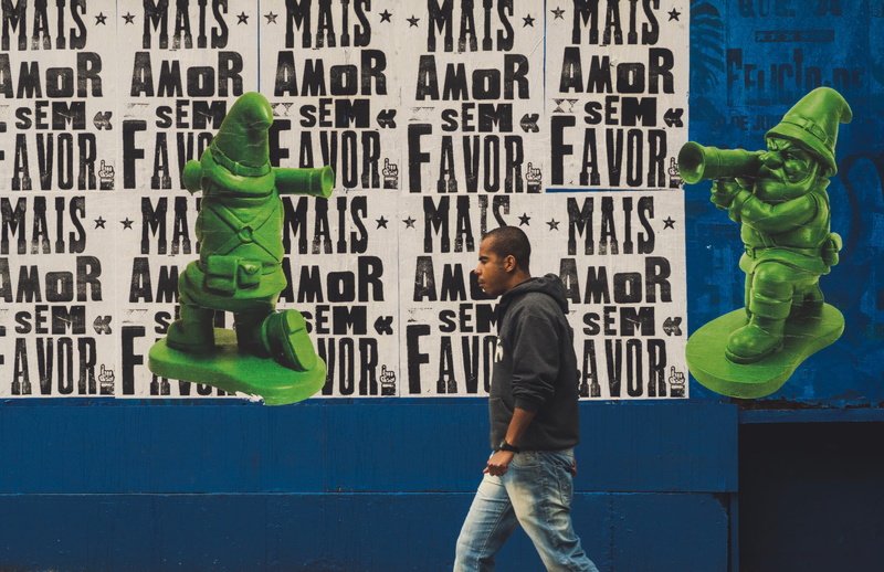 urban, building exterior, quote, leisure activity, city, graffit, young men, posters, brazil, são paulo, rear view, man, built structure, architecture