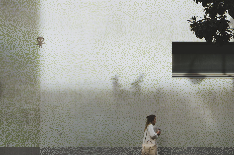 day, mosaic, walking, alien, long, casual clothing, nature, plant, one person, beside, wall - building feature, streetart, young women, young adult, daytime