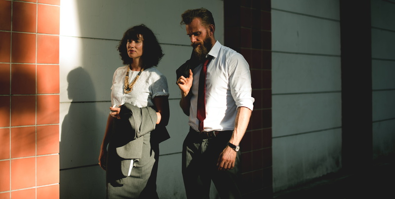 close-up, wall, corporate, front view, fashion, three quarter length, fashionable, walking, women, built structure, city, two people, togetherness, people