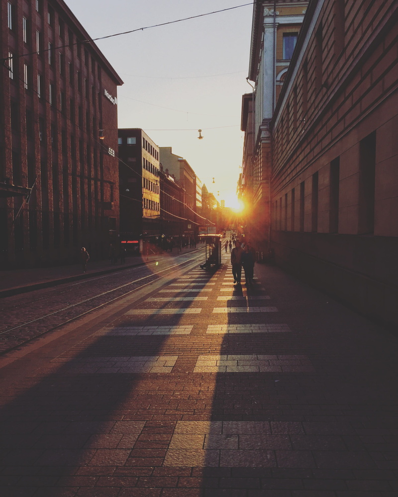 crosswalk, building Exterior, walking, city Life, 2K, outdoors, person, direction, setting sun, transportation, marking, buildings, sun, city street, sunset
