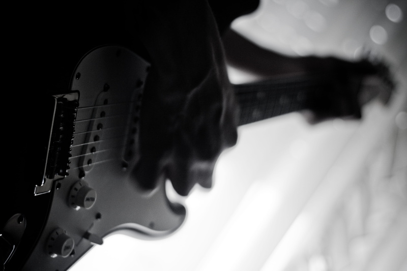 guitar, still life, white background, close-up, musical equipment, single object, bass guitar, man, instrument, guitar player, concert, grayscale, no people