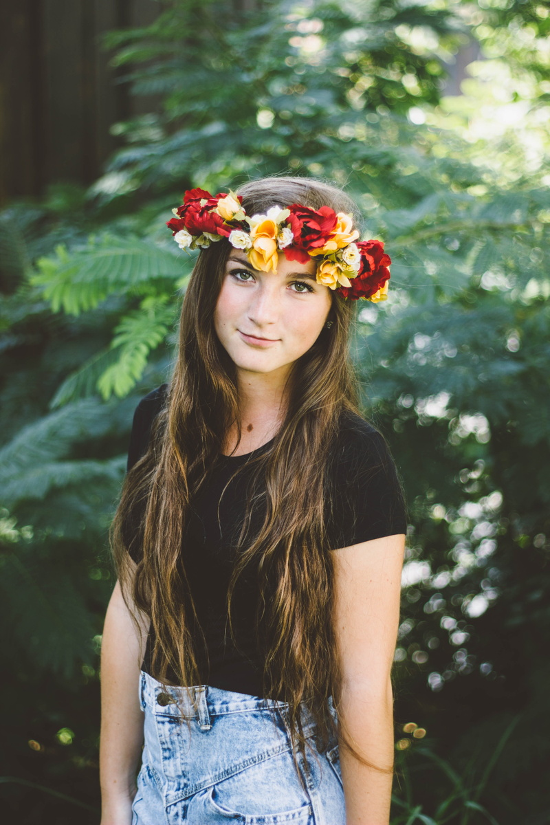 focus on foreground, plant, woman, shirt, yellow, one woman only, flower head, brunette, lifestyles, crew-neck, young women, long Hair, teenager, 5K, one Person