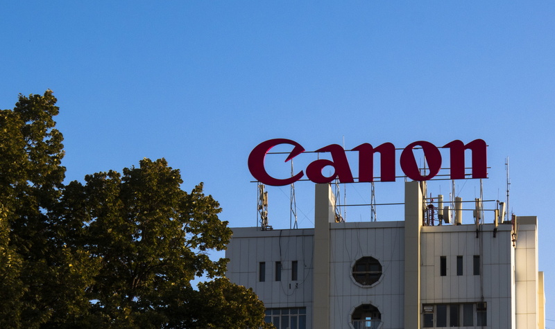 blue, building exterior, stop sign, sign, uzbekistan, built structure, tree, text, no people, sky, western script, capital letter, outdoors, nature, red