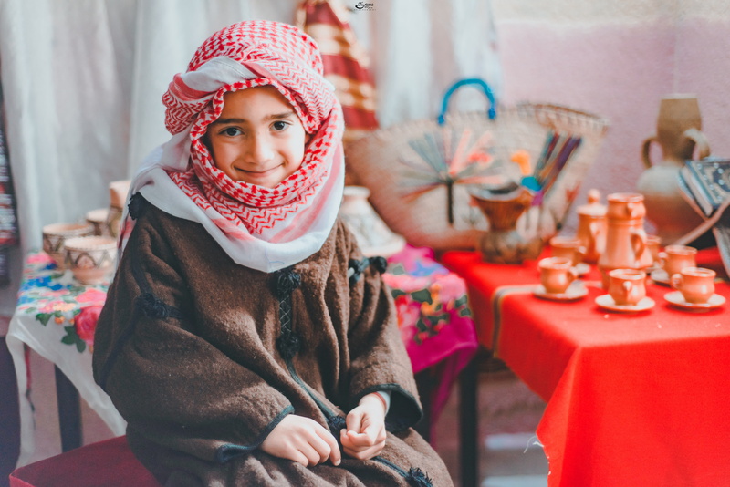 photo, young, waist up, clothing, girls, room, child, 5K, one person, warm clothing, lifestyles, focus on foreground, smiling, red, happy, scarf, domestic
