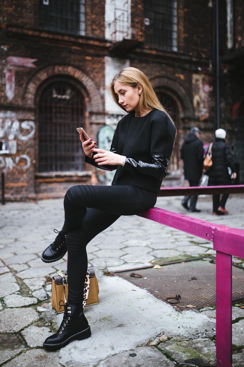 one person, woman, Europe, women, smart phone, outdoors, sitting, portrait, street, model, female, young, built structure, street fashion, leisure activity