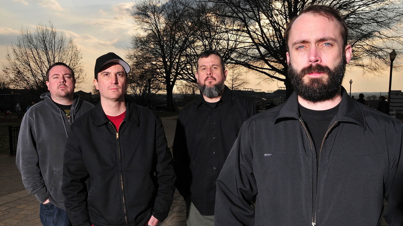 black, real people, sky, aggression, tree, beard, mid adult men, s, standing, looking at camera, beards, adult, mid adult, young men, trees, outdoor, waist up