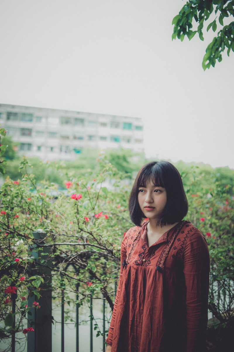 park, outdoors, flowers, fashion, women, portrait, young, wear, person, standing, tree, hairstyle, contemplation, lifestyles, female, front view, photography