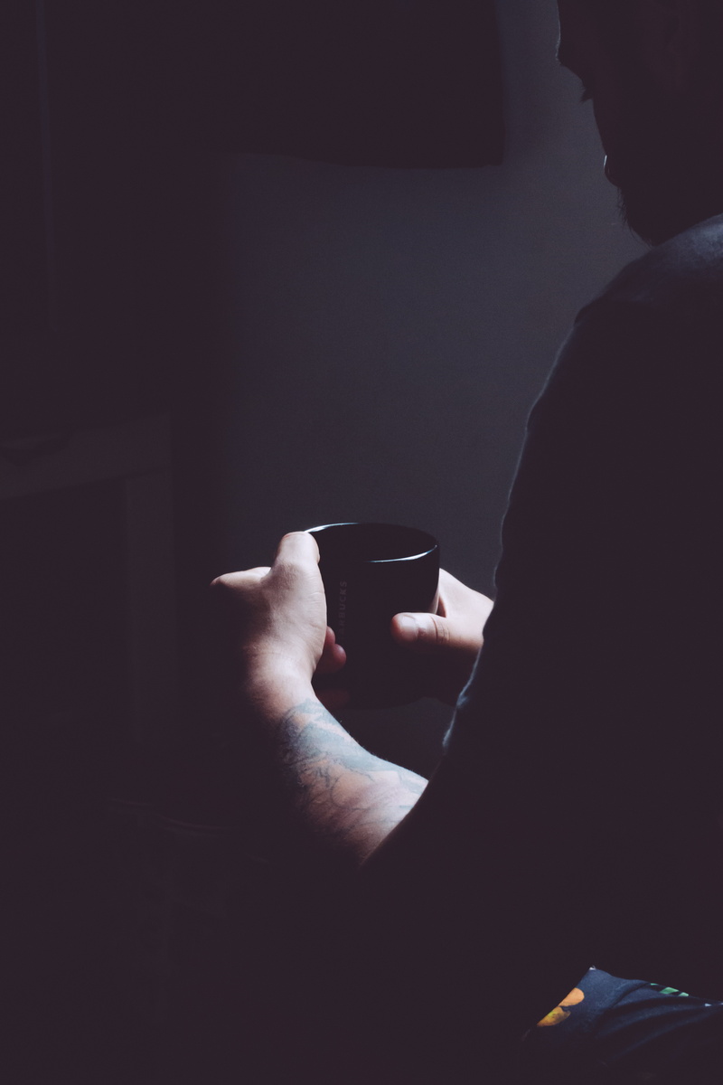drinking, lifestyles, dark, leisure activity, coffee - drink, one person, male, indoors, coffee cup, adult, photography, food and drink, refreshment, ceramic