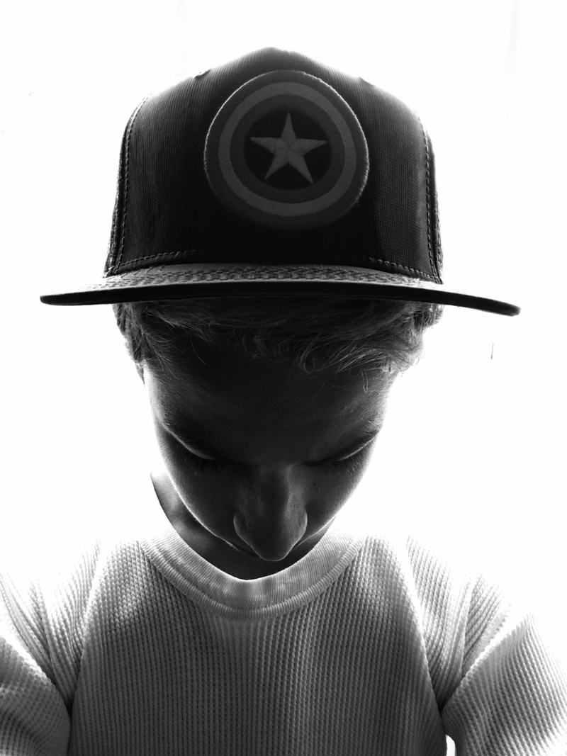 adult, urban, united states, hat, lifestyles, snapback, 2K, obscured face, wake forest, close-up, indoors, clothing, portrait, casual clothing, studio shot