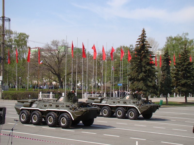 no people, armed forces, land vehicle, architecture, nature, built structure, government, victory day, armored transport vehicle, plant, parade, area, transportation