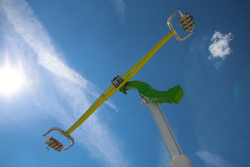 motion, sport, leisure, flying, folk festival, outdoors, ride, directly below, blue, sky, 5K, environment, fairground, sunlight, technology, nature, tilt