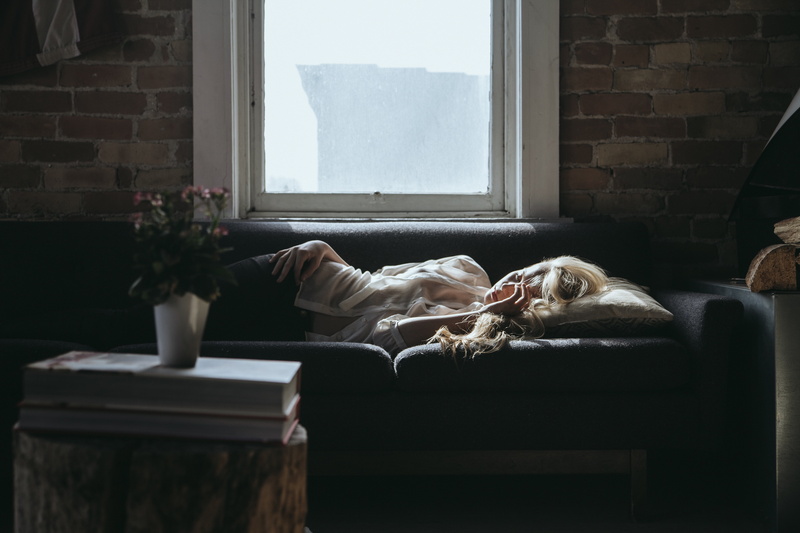 glass, dog, relaxing, lying down, shirt, pets, relaxation, mammal, day, blonde, black, home, white, female, one animal, sofa, vertebrate, dream, animal themes