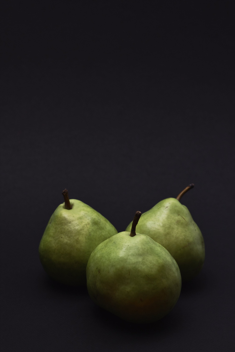 black background, light, colored background, colour, green color, pear, 5K, studio shot, indoors, studio, still life, healthy, close-up, cut out, shape