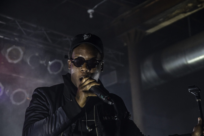dark, males, live, protective eyewear, adult, low angle view, music, mask, famous, waist up, portrait, skizzy mars, glasses, social issues, front view