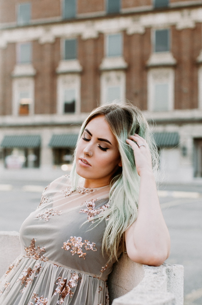 people, young women, built structure, pierced, contemplation, city, day, v, real people, women, portrait, leisure activity, nosering, one person, live
