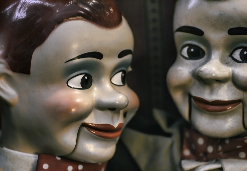 photo, art and craft, religion, no people, two, front, close, looking, store, 5K, mirror, ventriloquist, puppet, close-up, indoors, male likeness, slappy