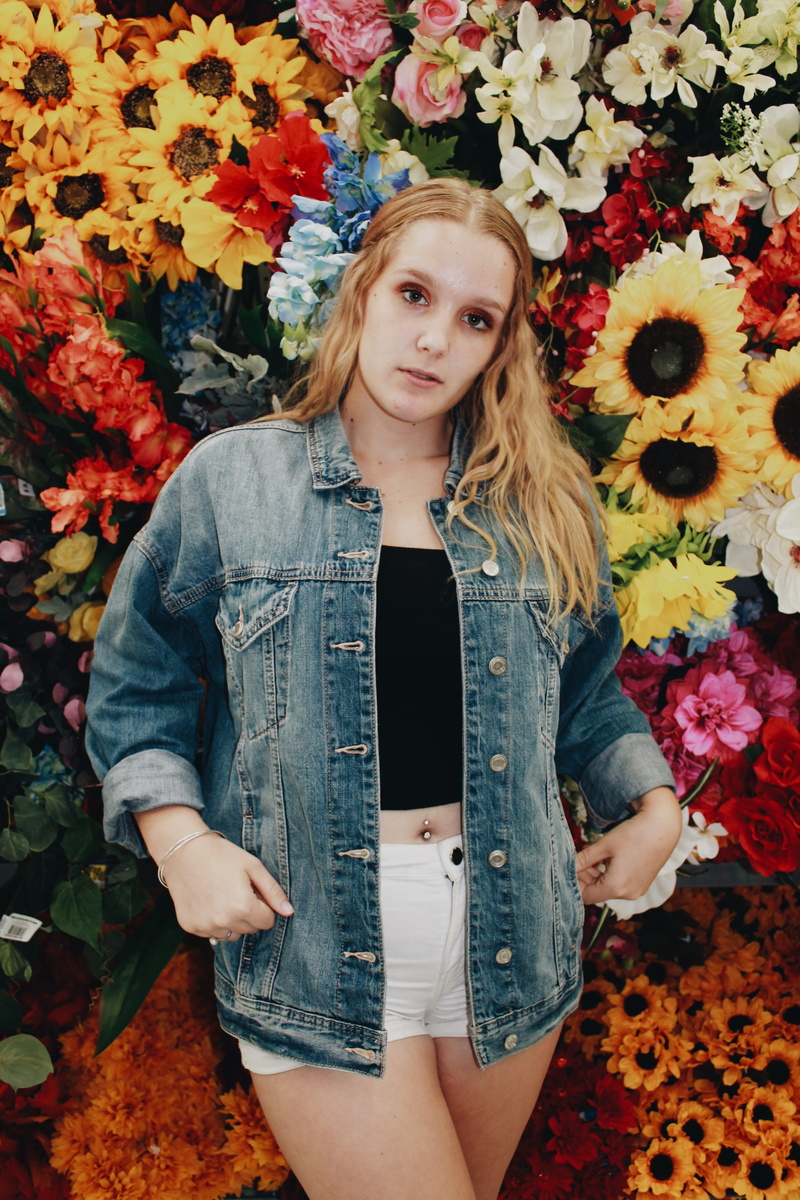 teenager, hairstyle, standing, one person, jeanjacket, 4K, flowering plant, hair, lifestyles, change, outdoors, girl, plant, flowers, day, flower head