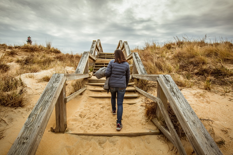 nature, daytime, female, dune, pipeline, the way forward, stairway, sky, outdoors, woman, cloudy, walking away, lighthouse, lifestyles, people, women, architecture