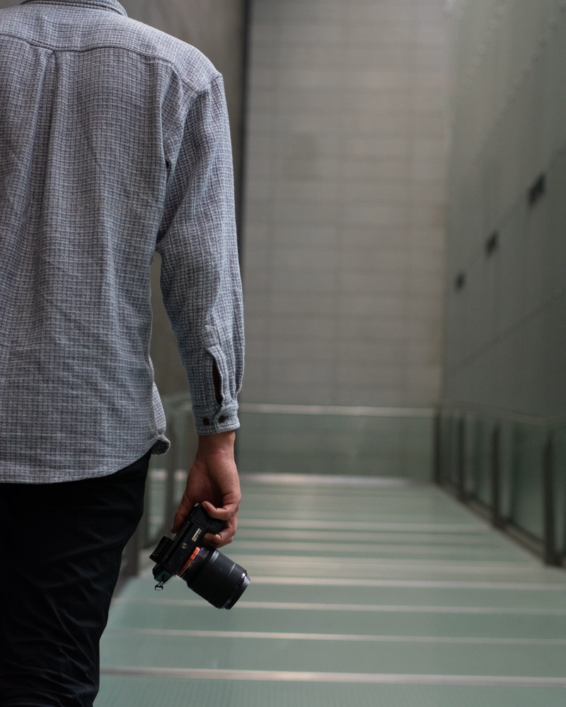 men, art, electronic, back, inside, man, one person, 4K, photographic equipment, midsection, camera, walking, standing, artist, indoor, gear, interior