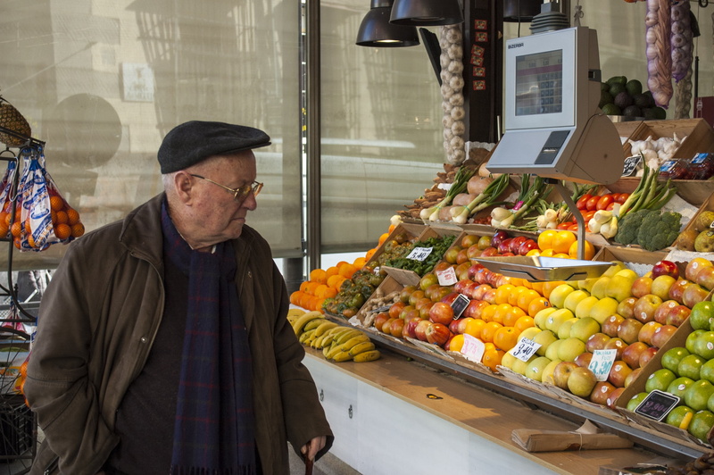 real people, one person, apples, onions, senior adult, orange, scale, tomatoes, standing, san miguel market, elder, food and drink, healthy eating, choice