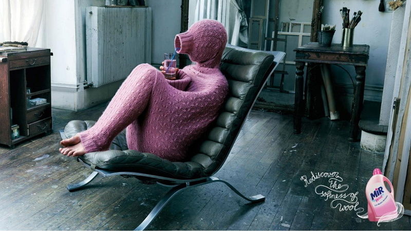 human representation, home interior, chair, armchair, black, sweater, leather, table, commercial, pink color, relaxation, sitting, full length, indoors