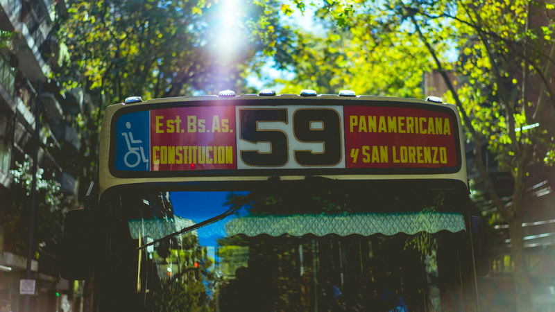 black, number, nature, information sign, high, tree, day, near, text, sun flair, rise, building, yellow, trees, communication, transportation, plant, architecture