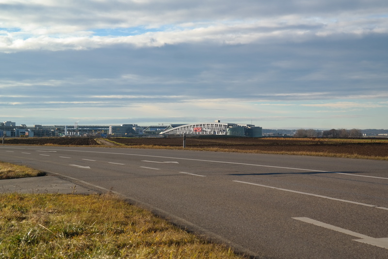 asphalt, bosch bridge, empty road, marking, nature, outdoors, dividing line, cloud - sky, transportation, bosch car garage, built structure, road marking