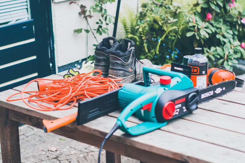 toy, day, equipment, large group of objects, axe, sunlight, tool, wood - material, growth, transportation, chainsaw, shoe, carrot, potted plant, plywood