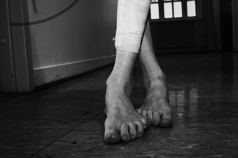 human foot, human body part, woman, limb, real people, standing, body part, human limb, day, one person, flooring, door, aggression, lifestyles, architecture