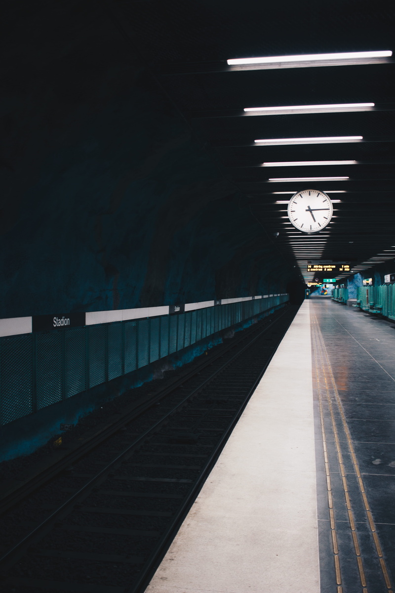 train station, railroad track, illuminated, railroad station platform, built structure, station, long, no people, transportation, ceiling, absence, empty