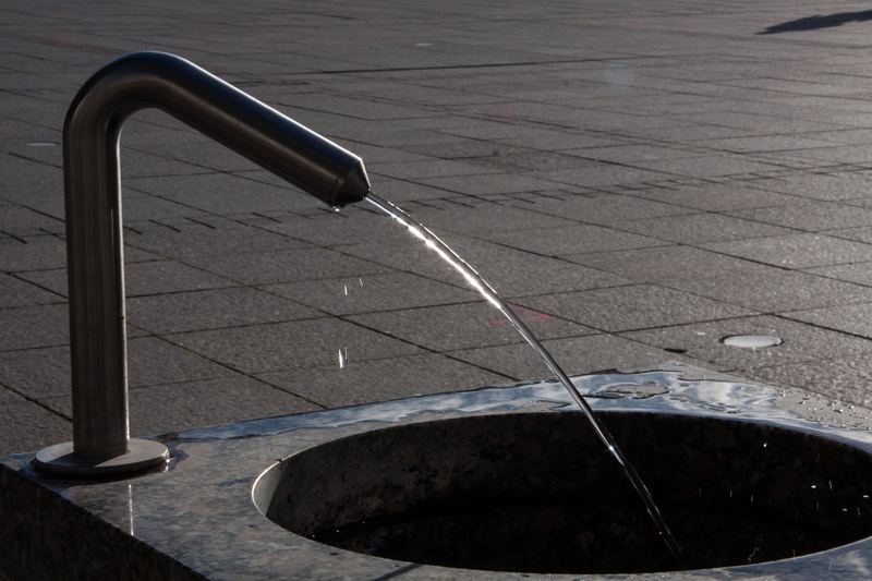 back light, wet, flooring, flowing water, outdoors, day, close-up, running water, nature, fountain, street, city, paving stone, footpath, 4K, faucet, no people