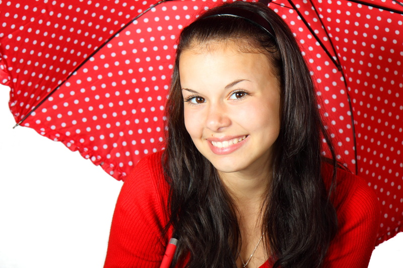 headshot, female, hairstyle, young, young adult, holding, dot, cute, smile, looking at camera, people, cheerful, studio shot, polka, front view, girl, happy