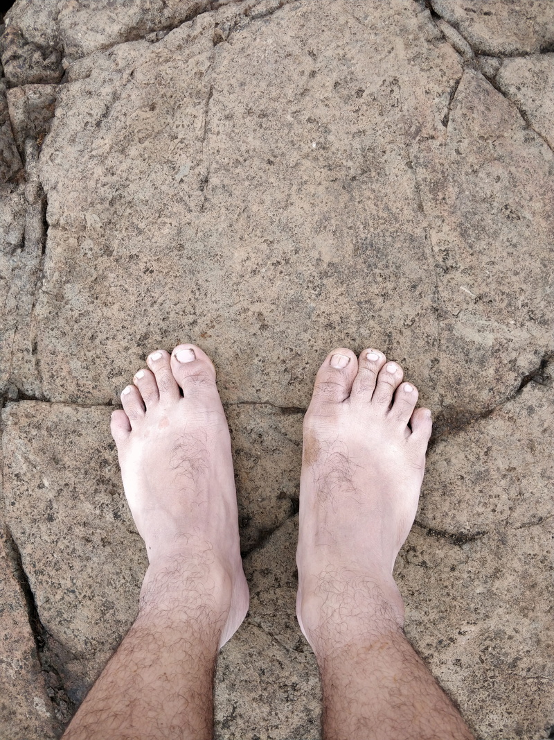 human leg, lifestyles, dirty, machiprabal, runner, wet, trek, mountain, mobile photography, day, toenail, one person, real people, human limb, soaked, leisure activity