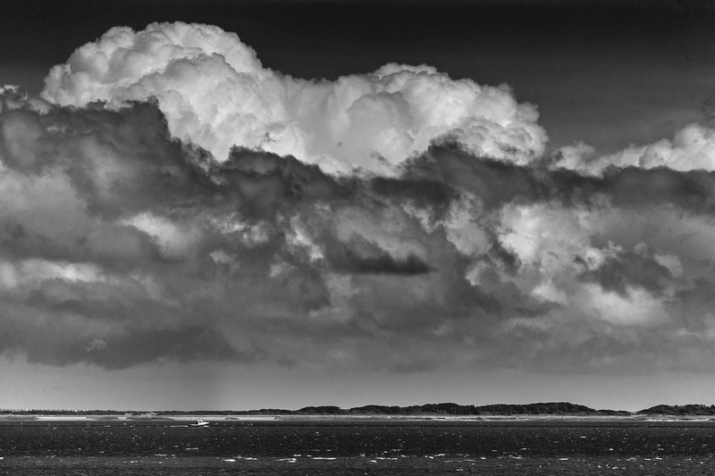 water, land, beauty in nature, seascape, black cloud, earth, beach, no people, clouds, nature, ominous, coast, cloudscape, big cloud, sky, grayscale, landscape
