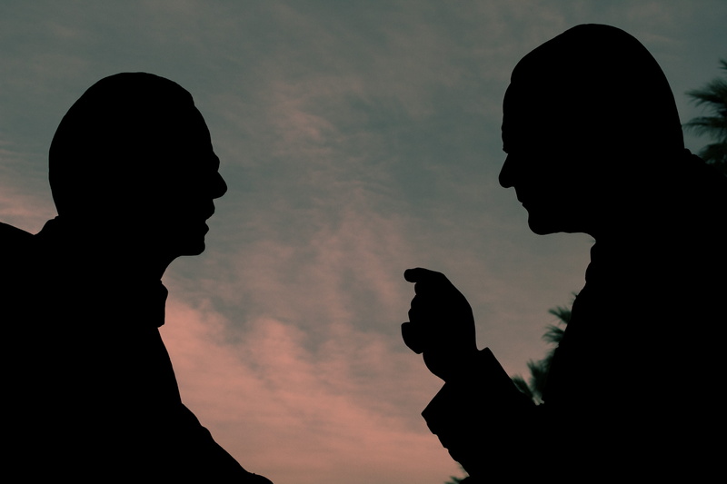 males, cloud - sky, lifestyles, two people, sky, portrait, togetherness, face to face, reverse light, adult, real people, friendship, silhouette, sunset