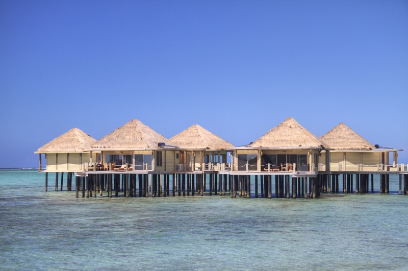vacations, waterfront, building exterior, clear sky, tourism, seawater, no people, relaxation, hotel, tourist Resort, day, beach, residential district