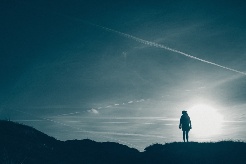beauty in nature, blue, tranquility, tranquil scene, woman, sky, leisure activity, vapor trail, cloud - Sky, people, full length, land, Silhouette, men