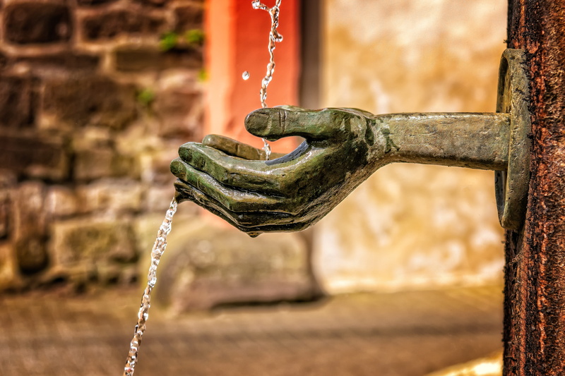 splash, drink, clean, sculpture, art and craft, animal representation, peaceful, hand, metal, focus on foreground, drip, click, human body part, bust, focus