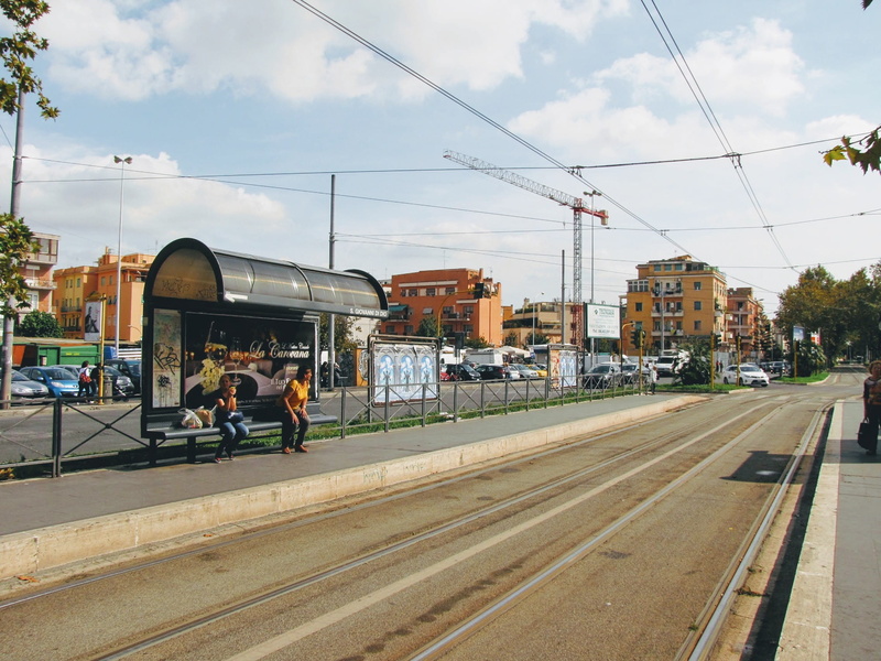 tracks, buildings, men, road, 1080P, real people, built structure, people, street, day, track, mode of transportation, railroad track, italy, tram, nature