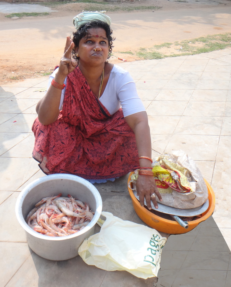 women, sale, freshness, high angle view, prawns, real people, fish wife, one person, 2K, table, price, holding, casual clothing, lifestyles, sitting, woman