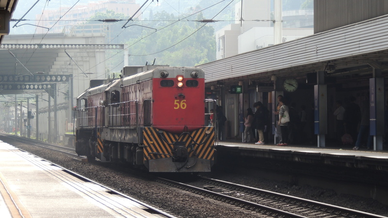 urban, architecture, kong, incidental people, railroad station, building exterior, mtr, metro, built structure, diesel, track, mode of transportation, hk