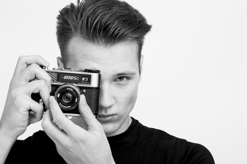 technology, camera - photographic equipment, holding, photographing, lifestyles, activity, fashion, 720P, white, retro styled, one person, young men, photography themes