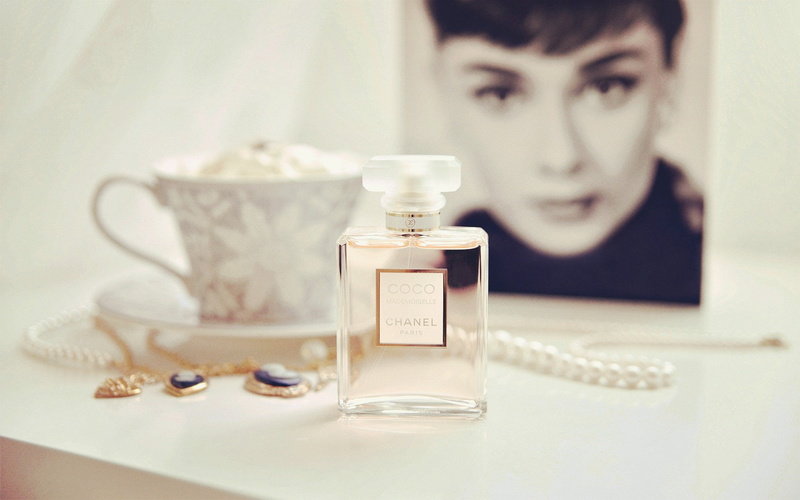 human body part, indoors, headshot, portrait, lifestyles, audrey, auburn, front view, table, domestic room, container, one person, perfume, beauty