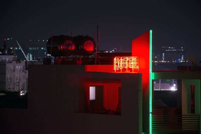 red, neon sign, reflection, outdoors, vietnam, built structure, neon, signs, architecture, street signs, 5K, building exterior, sign, light - natural phenomenon