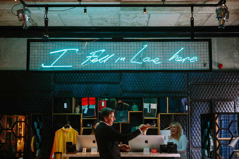 males, real people, computer, table, office, love, touch screen, indoors, sign, the dean dublin, standing, business, adult, text, grid, corporate business