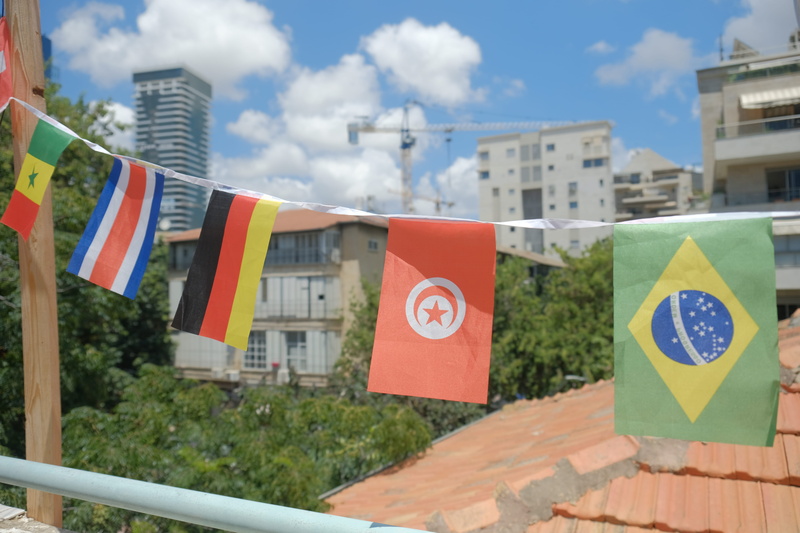 germany, flag, text, built structure, neighborhood, brazil, outdoors, office building, symbol, multi colored, sky, turkey, patriotism, day, town, textile
