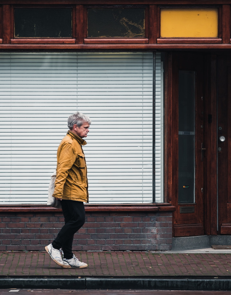 day, senior adult, built structure, males, casual clothing, side view, architecture, urban, 4K, beside, outdoors, one person, walking, front, real people