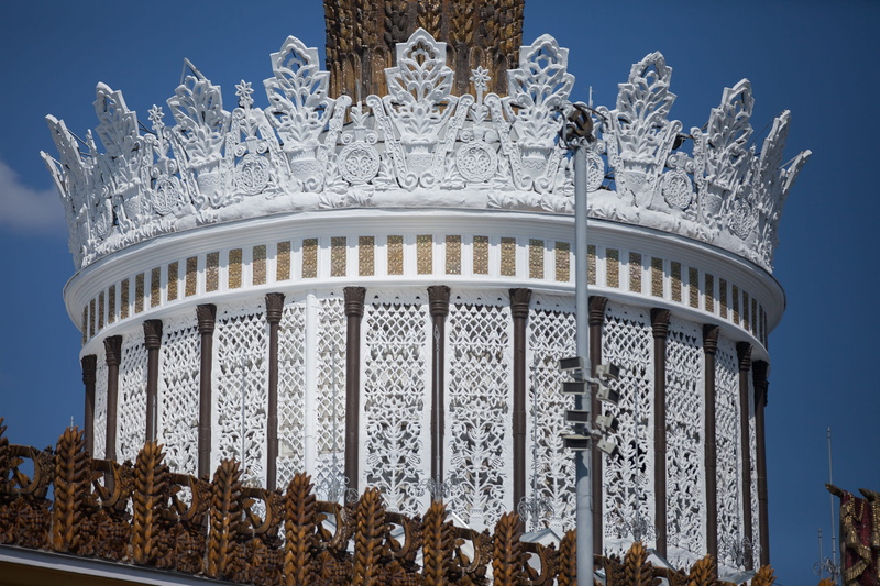 building, clear sky, history, building exterior, architecture, nature, the past, a fragment of the ukraine pavilion, tree, sky, moscow, ornate, plant, art and craft