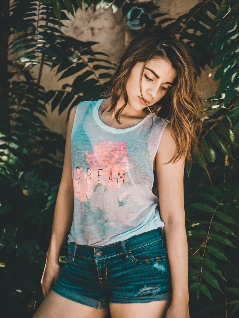 flower, teenager, looking, photo, lifestyles, sheer, standing, tree, downward, young adult, hair, beside, one person, casual clothing, outdoors, plant