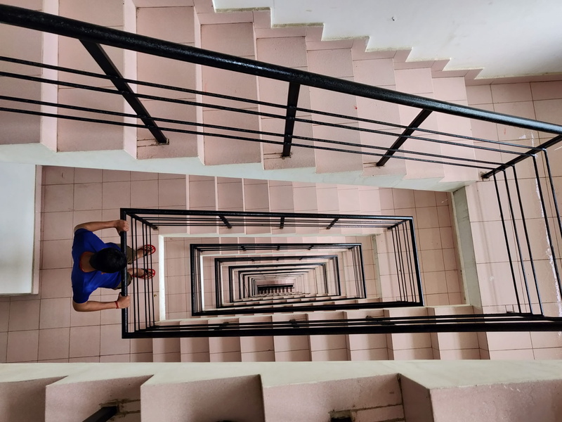 downwards, day, step, looking, built structure, pattern, perspective, 4K, steps and staircases, hanging, contemporary, clothing, design, building, man